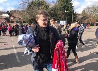 Pictured is Phillip Cooper selling scarves for Shrovetide in Ashbourne. Photo: Tom Morley