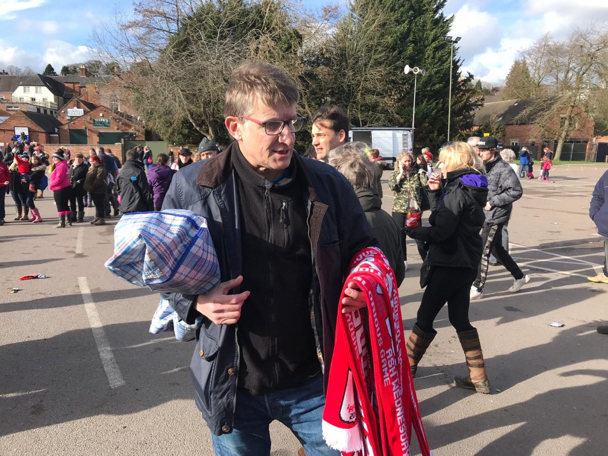 Pictured is Phillip Cooper selling scarves for Shrovetide in Ashbourne. Photo: Tom Morley