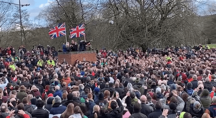 The ball being turned up at Ashbourne Shrovetide