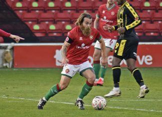 Stuart Sinclair playing in midfield for Walsall FC