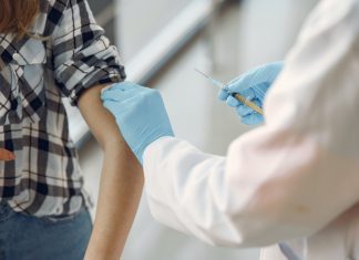 Covid-19 coronavirus person getting vaccine vaccinated