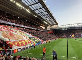 A picture of Anfield with a banner by Tommy Lister