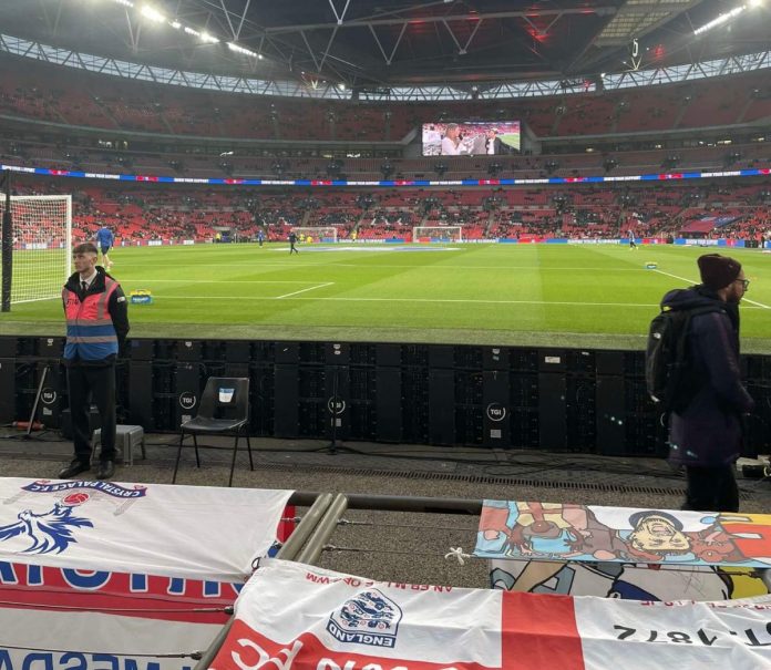 This image shows Wembley Stadium on the evening of an England game.