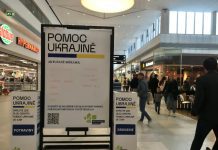 A charity sign with current sought after items for Ukrainian refugees, April 2022