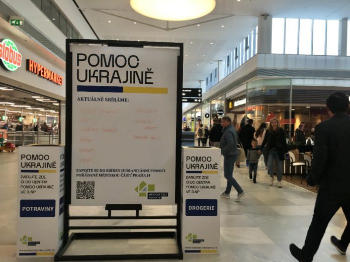 A charity sign with current sought after items for Ukrainian refugees, April 2022