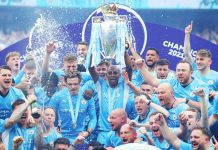 This is an image of the Manchester City team lifting the trophy.
