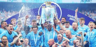 This is an image of the Manchester City team lifting the trophy.