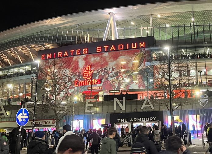 Pictured is the Emirates Stadium at night