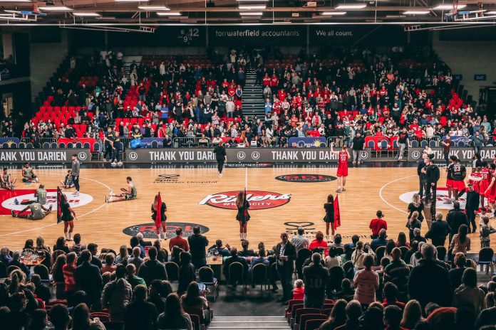 Darien Nelson-Henry announcing his retirement on-court.