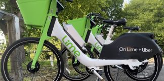 Lime E-bikes line up in dedicated areas across Derby. Credit: Harry Merrell