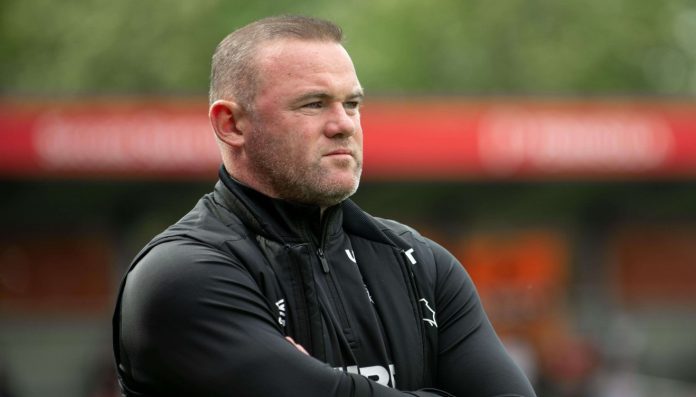 Derby County manager Wayne Rooney watches over his side 2021 pre season (Credit- Howard Harrison / Alamy Stock Photo)