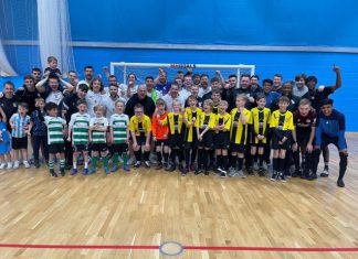 Derby Futsal squad with younger ambassador team