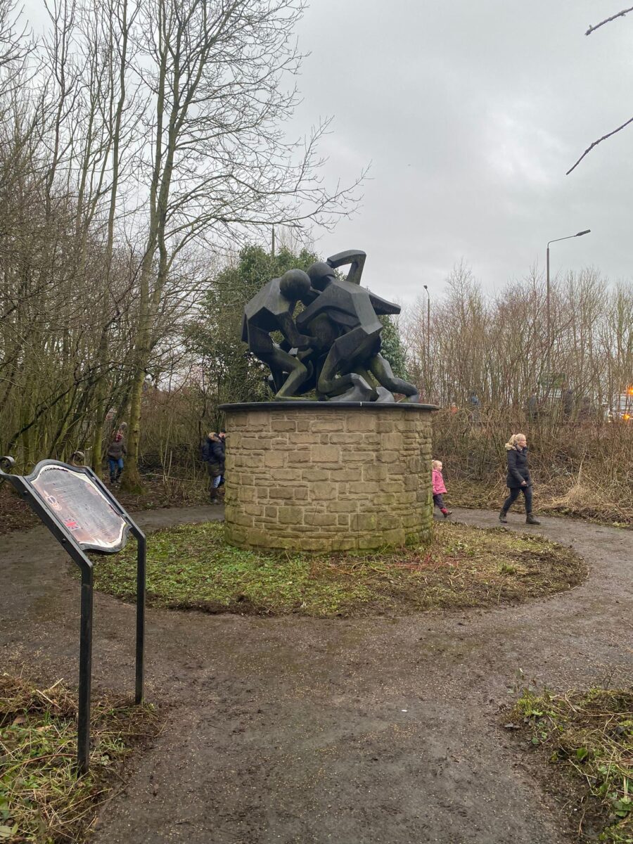 This image shows the Hug statue in Ashbourne