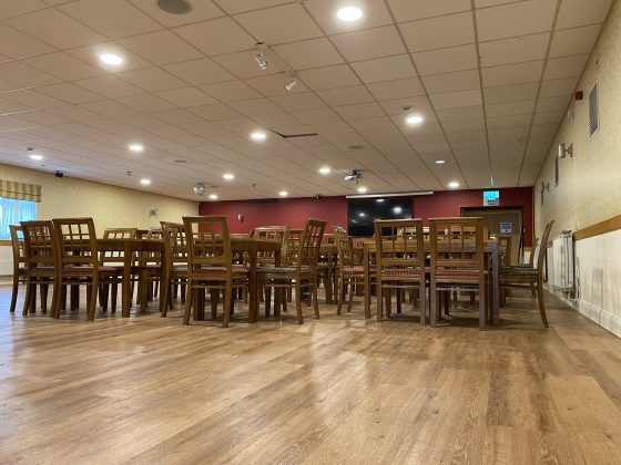 Inside the clubhouse with new flooring at Belper Town.