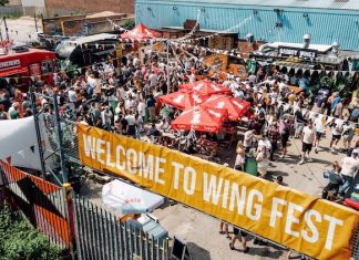 The photo is taken from above a Bustler Market where hundreds of people met eat chicken wings and drink and have fun.