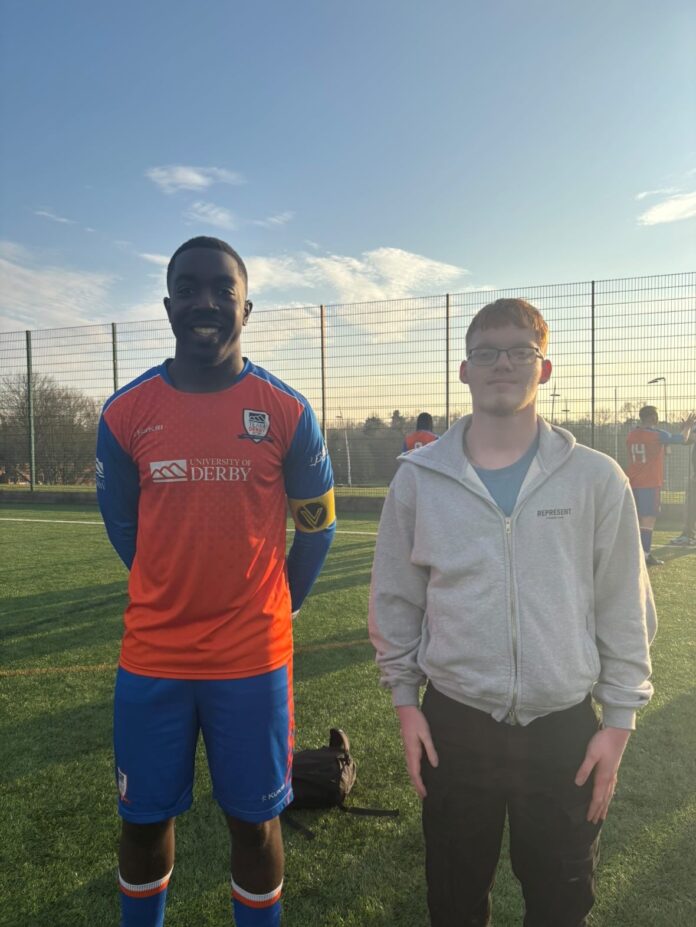 This image shows a football journalism student interviewing University of Derby firsts player.