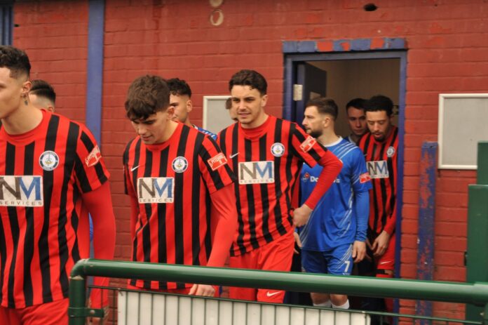 Long Eaton United players walking out ready to play a game