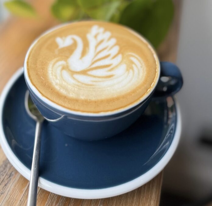 A coffee containing Swan art at Sanchini's Coffee Bar