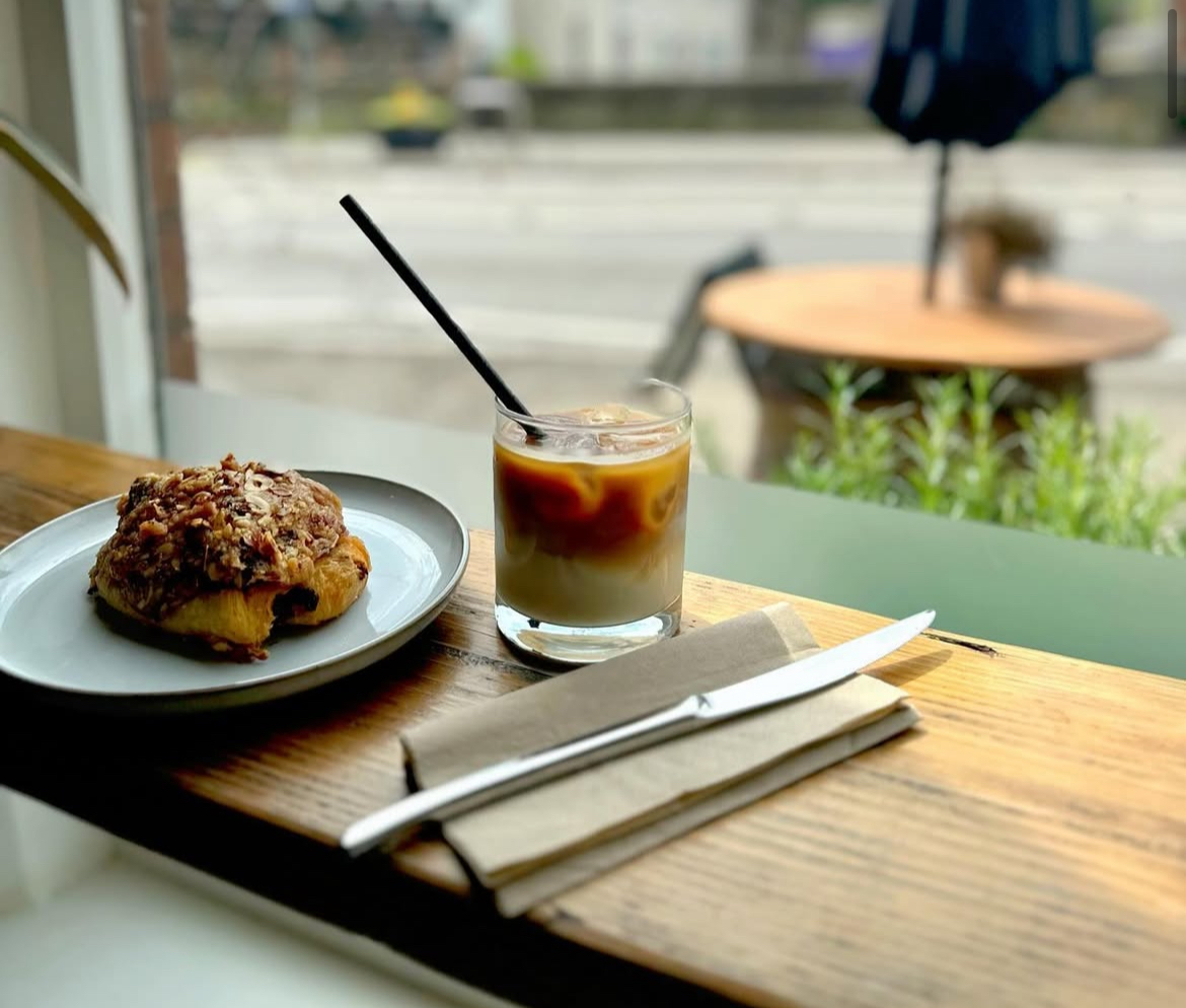 A Hazelnut Pain Au Chocolat and Iced Hazelnut Latte at Sanchinis Coffee Bar.