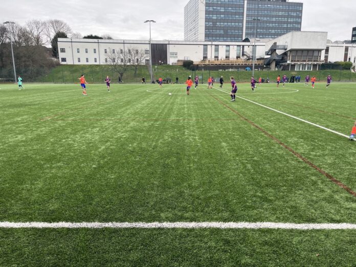 Derby men's firsts (orange and blue) facing Loughborough seconds (purple) at Kedleston Road (university of derby main campus)