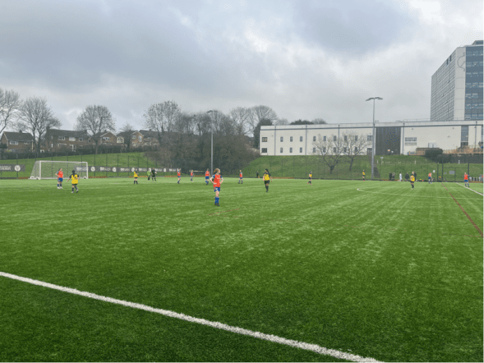 Derby (in orange shirts) play East Anglia Women. Credit: Kallum Thresher-Wilding.
