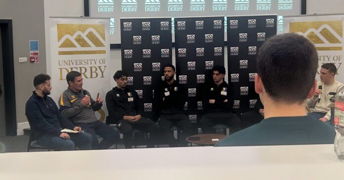 Mansfield Town manager, Nigel Clough, and players, George Abbott, Tyler Roberts, Oliver Irow and Liam Roberts being interviewed by a selection of Derby alumni.