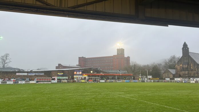 An image of the Raygar Stadium being overlooked by the Belper Mill complex