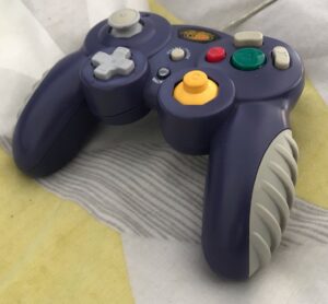 a purple GameCube controller