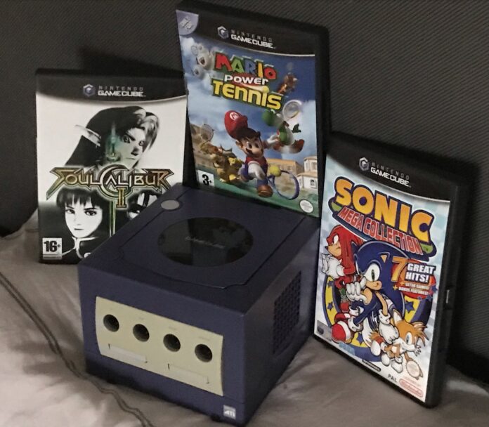 A purple gamecube and some games