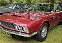 Elegance on the lawn: see the most captivating classics at Gawsworth Hall 2026 A red Aston Martin DBS V8
