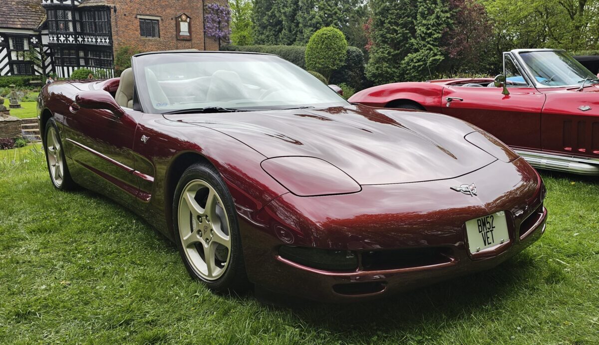 A ruby red Chevrolet Corvette Convertible C5